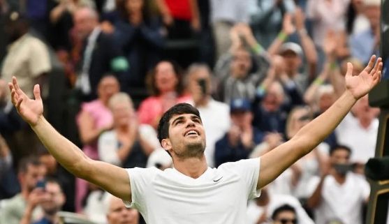 Carlos Alcaraz Wimbledon champion celebration.
