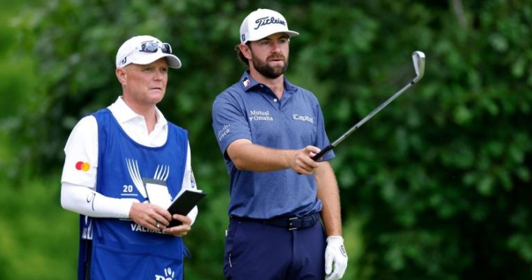 Cameron Champ and his caddie Chad Reynolds on the PGA Tour course